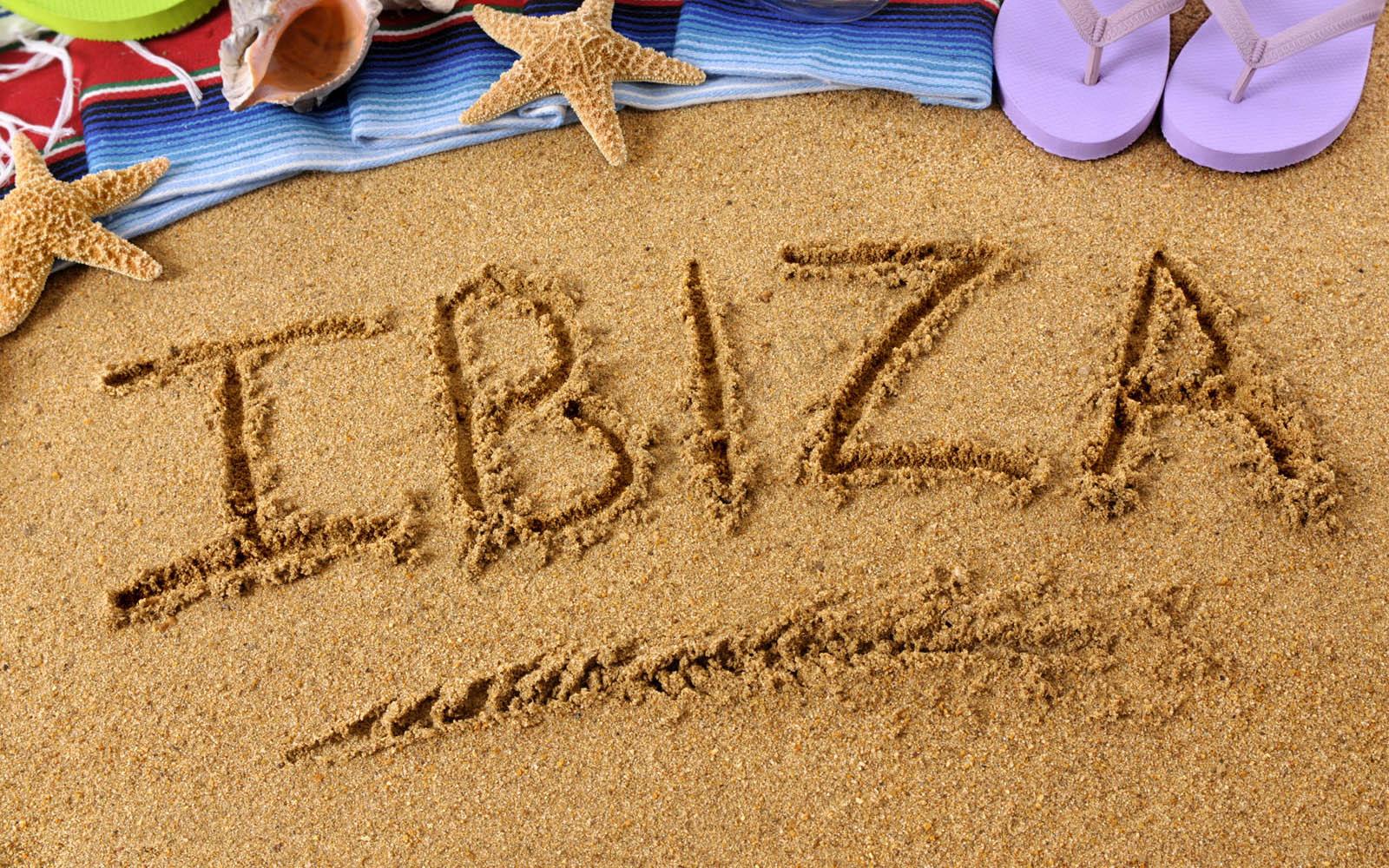 Ibiza beach writing
